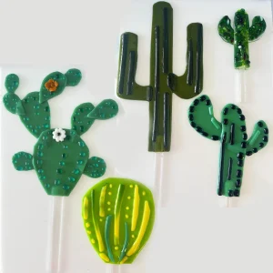 Five decorative plant stakes in the shape of various cactus plants made at Glass Duchess Studio, Port Charlotte FL